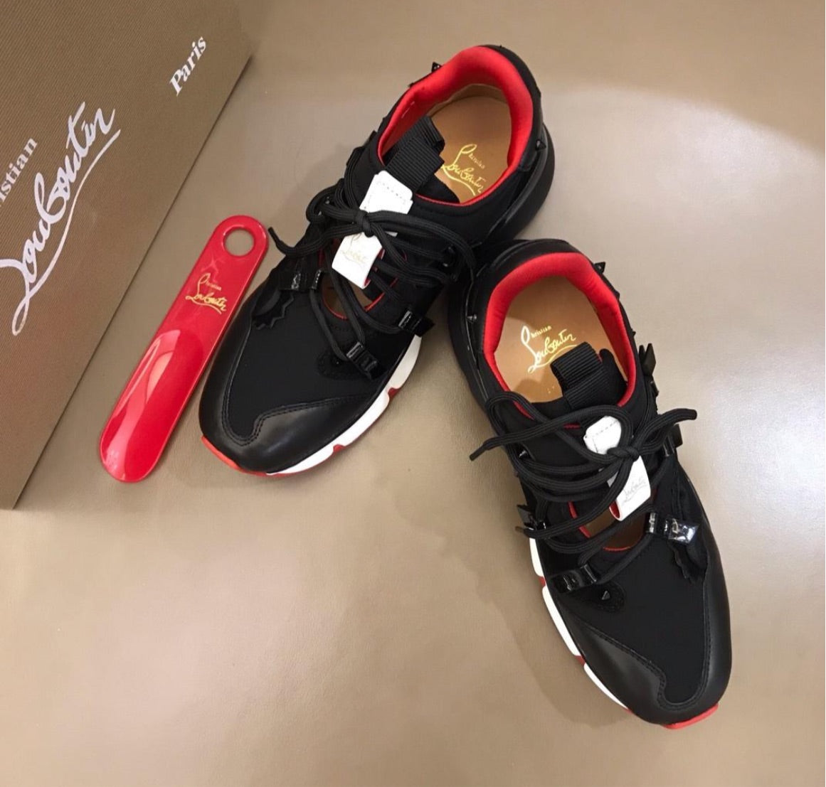 New Lou red bottom sneakers