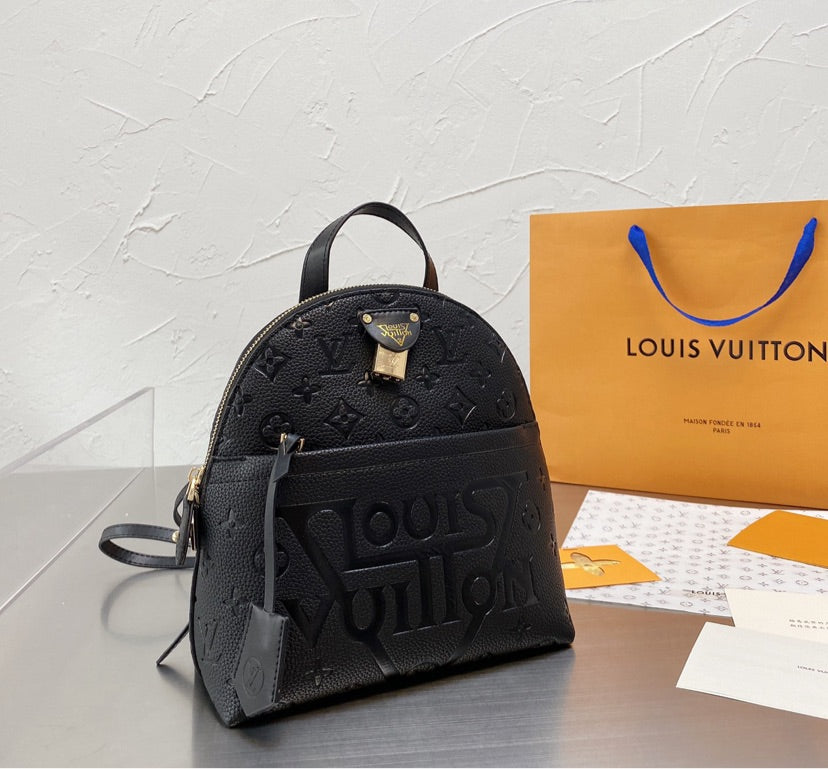 Leather LV shoulder handbag/ backpack
