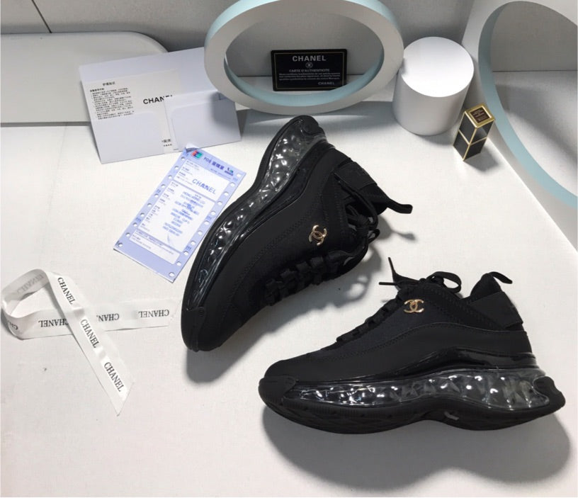 Black Chanel sneakers