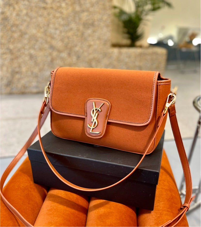 Pop of color YSL woman handbag