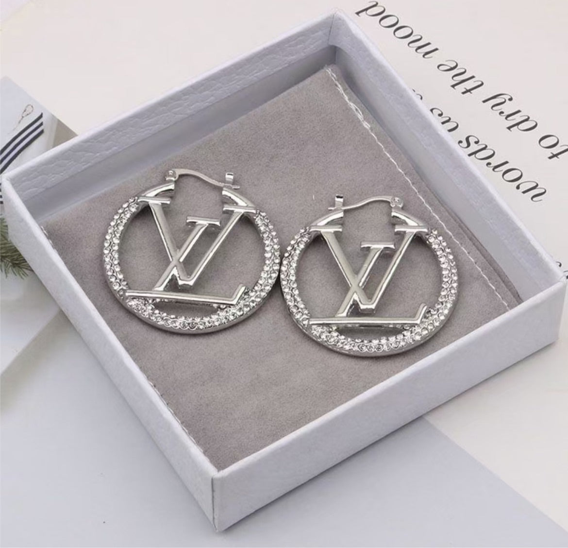 Silver LV woman earring