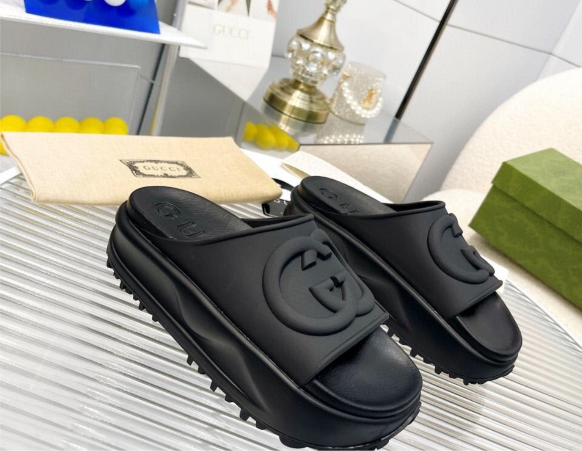 Black Gucci slides