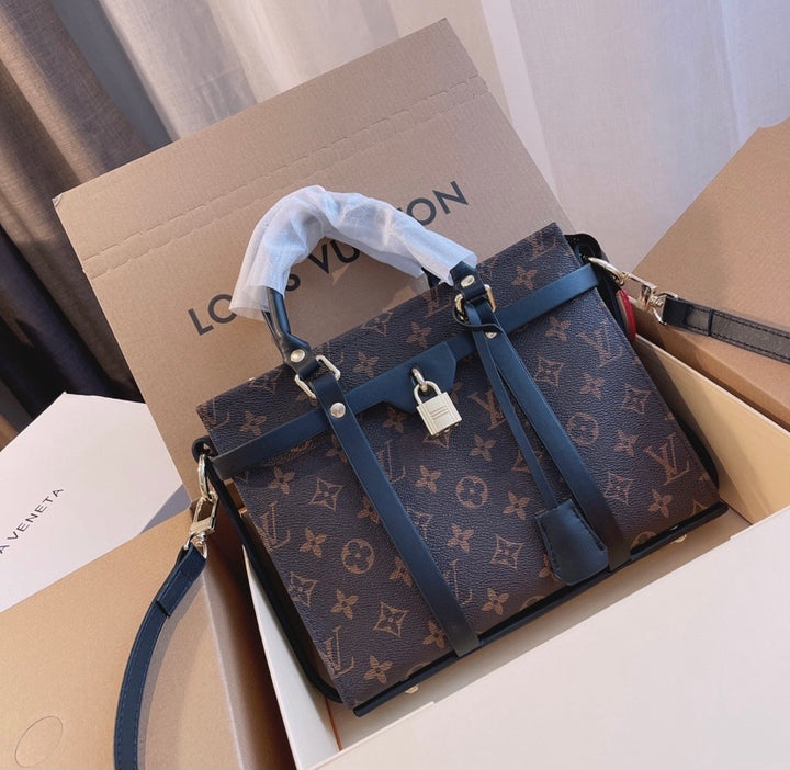 LV a woman shoulder handbag
