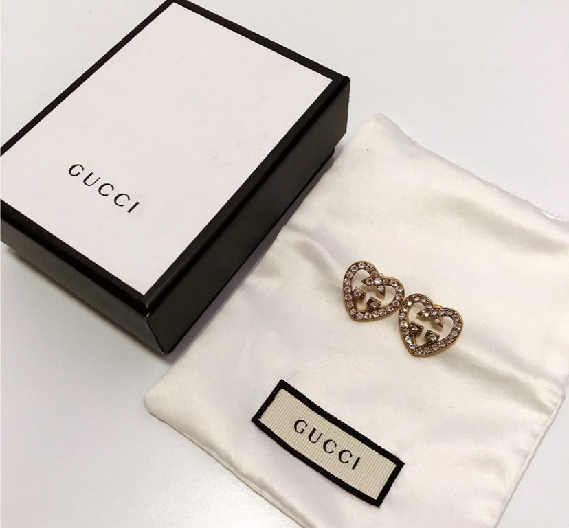Gucci woman heart shaped earrings
