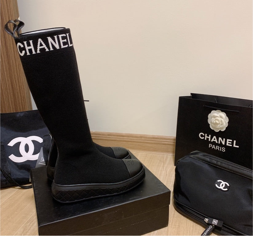 Black Chanel woman boots