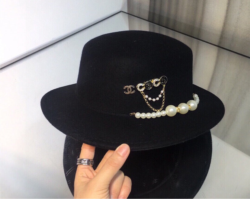 Chanel woman Black hat