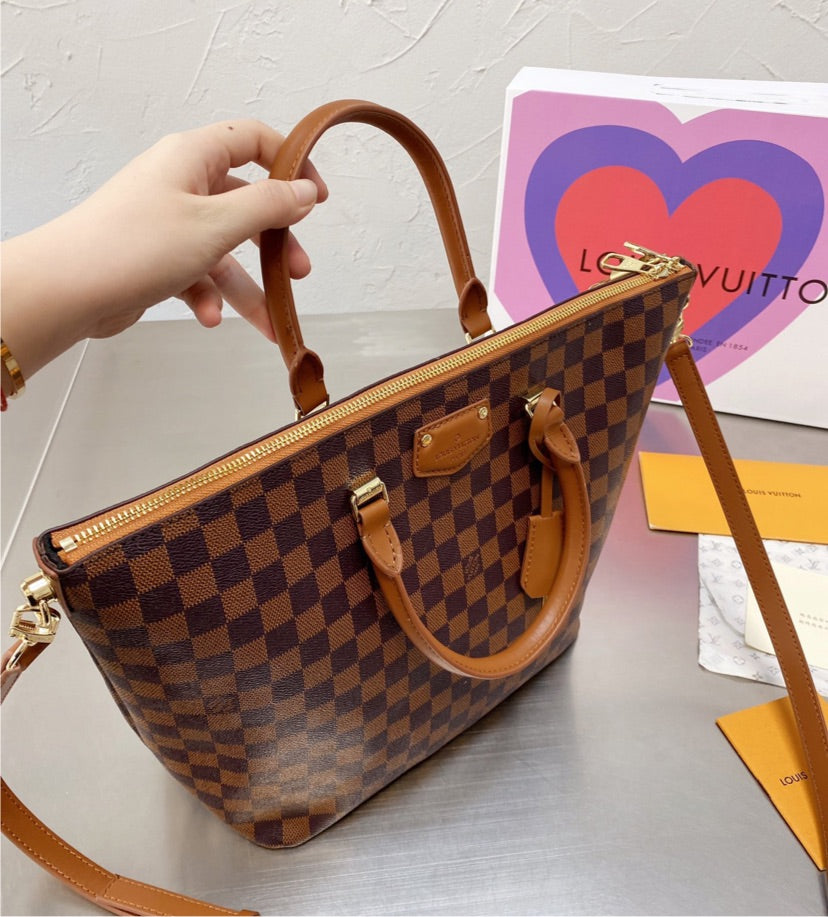 brown LV woman handbag