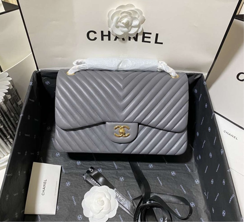Grey Chanel woman handbag
