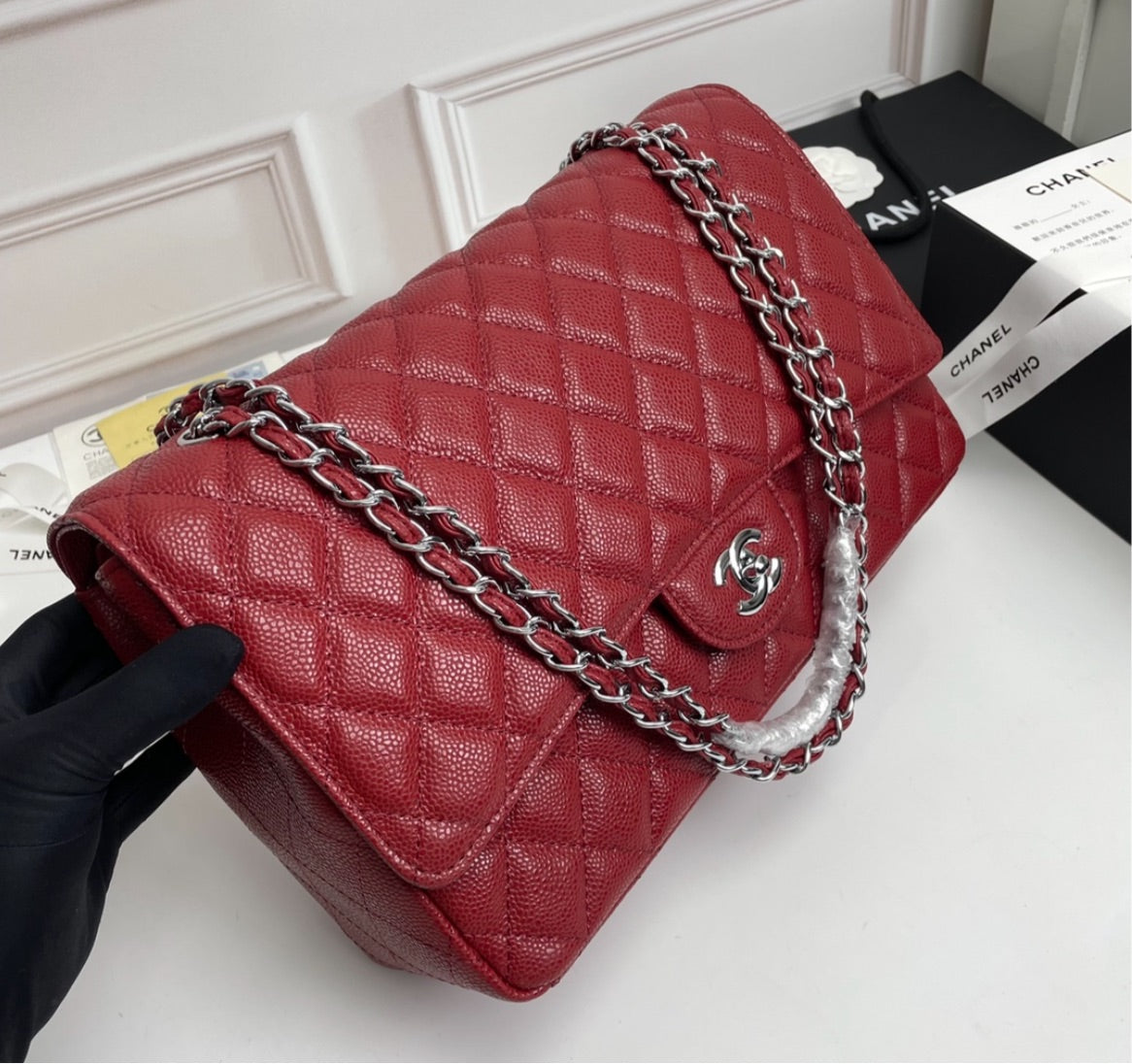 Fierce red Chanel woman handbag