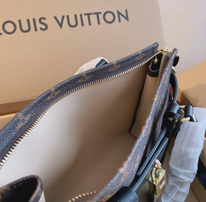 LV a woman shoulder handbag