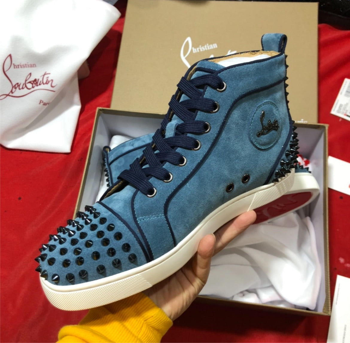 New red bottom sneakers