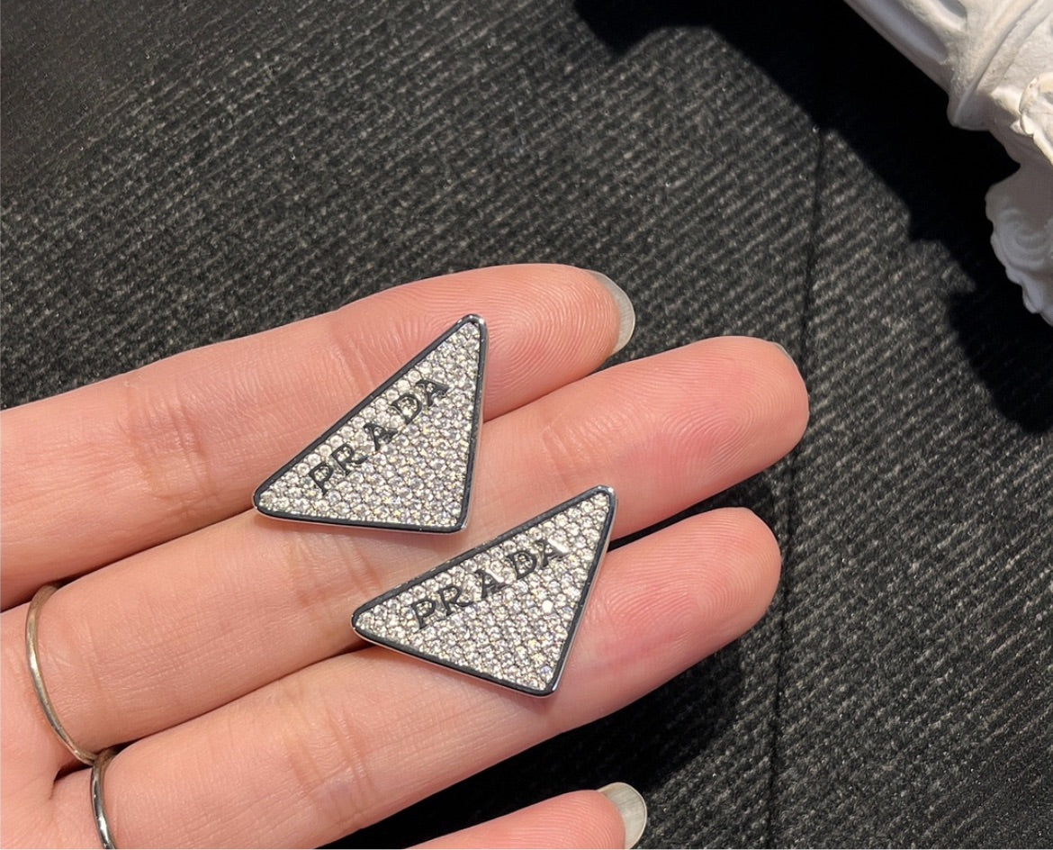 Silver Prada stud earring