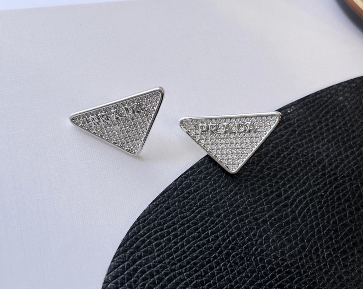 Silver Prada stud earring