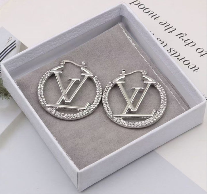 Silver LV woman earring