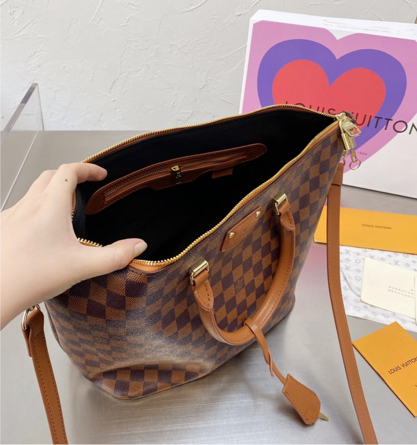 brown LV woman handbag