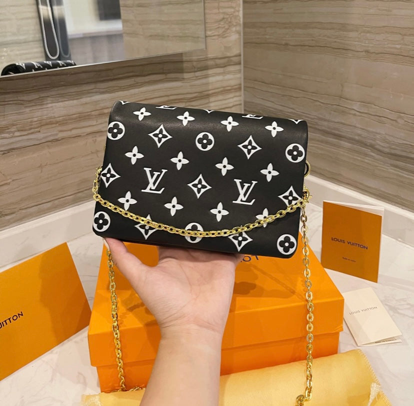 LV woman shoulder handbag