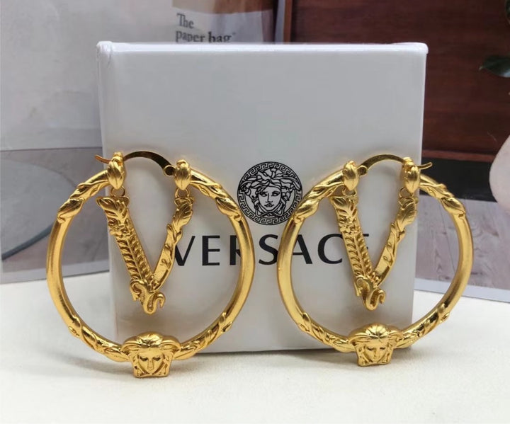 New gold plate Versace earrings