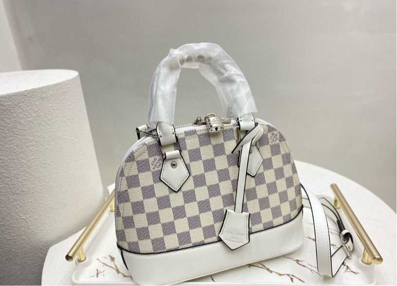 White LV woman shoulder handbag