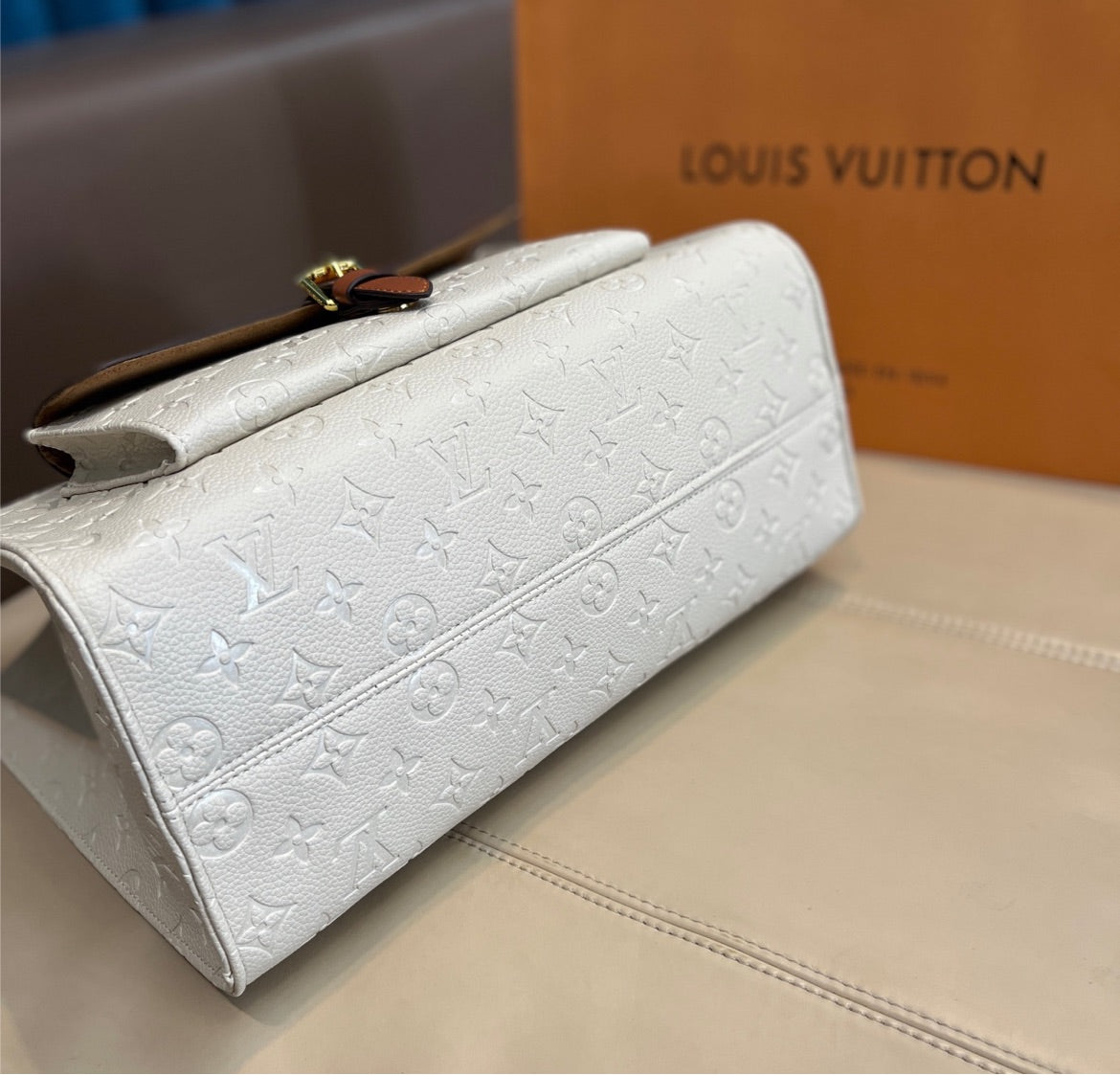 Woman Louis V handbag