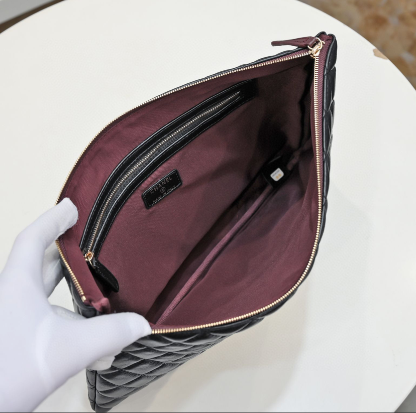 Chanel big handbag/clutch