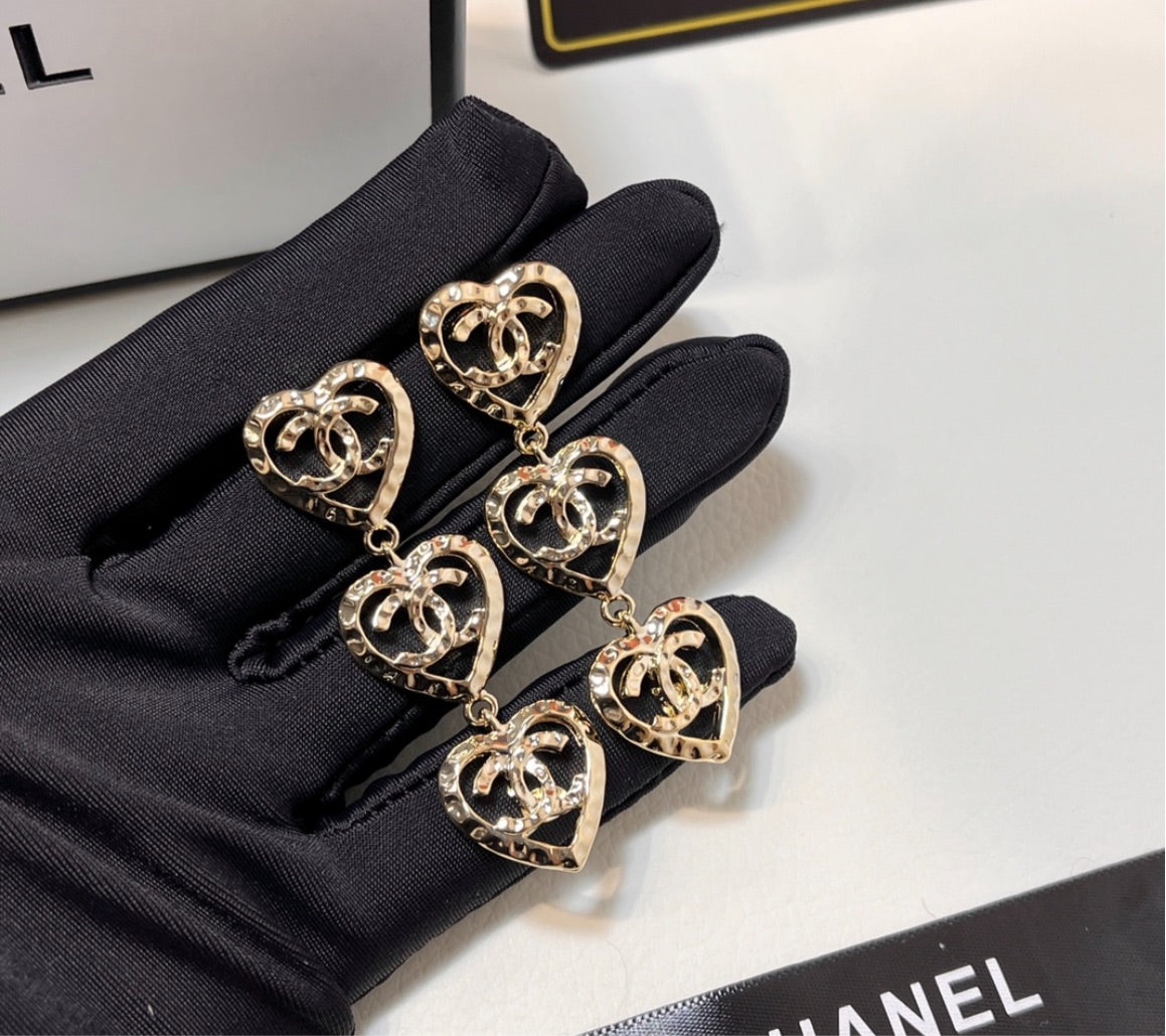 Heart shaped Chanel woman earring