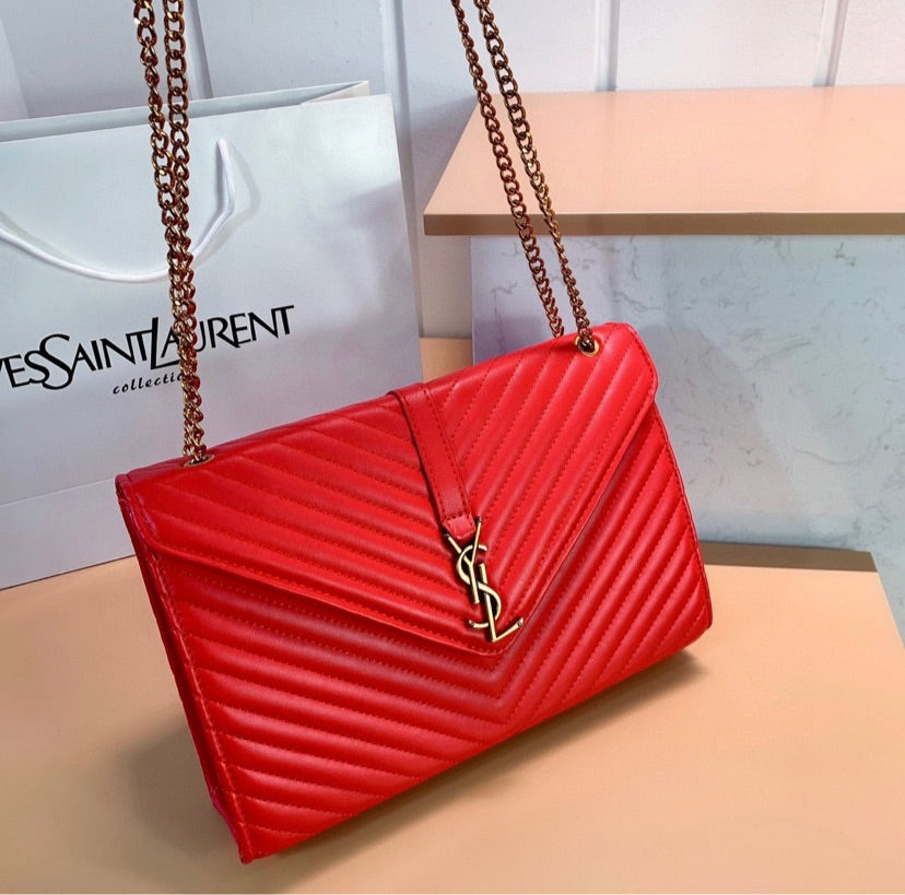 Red YSL woman handbag