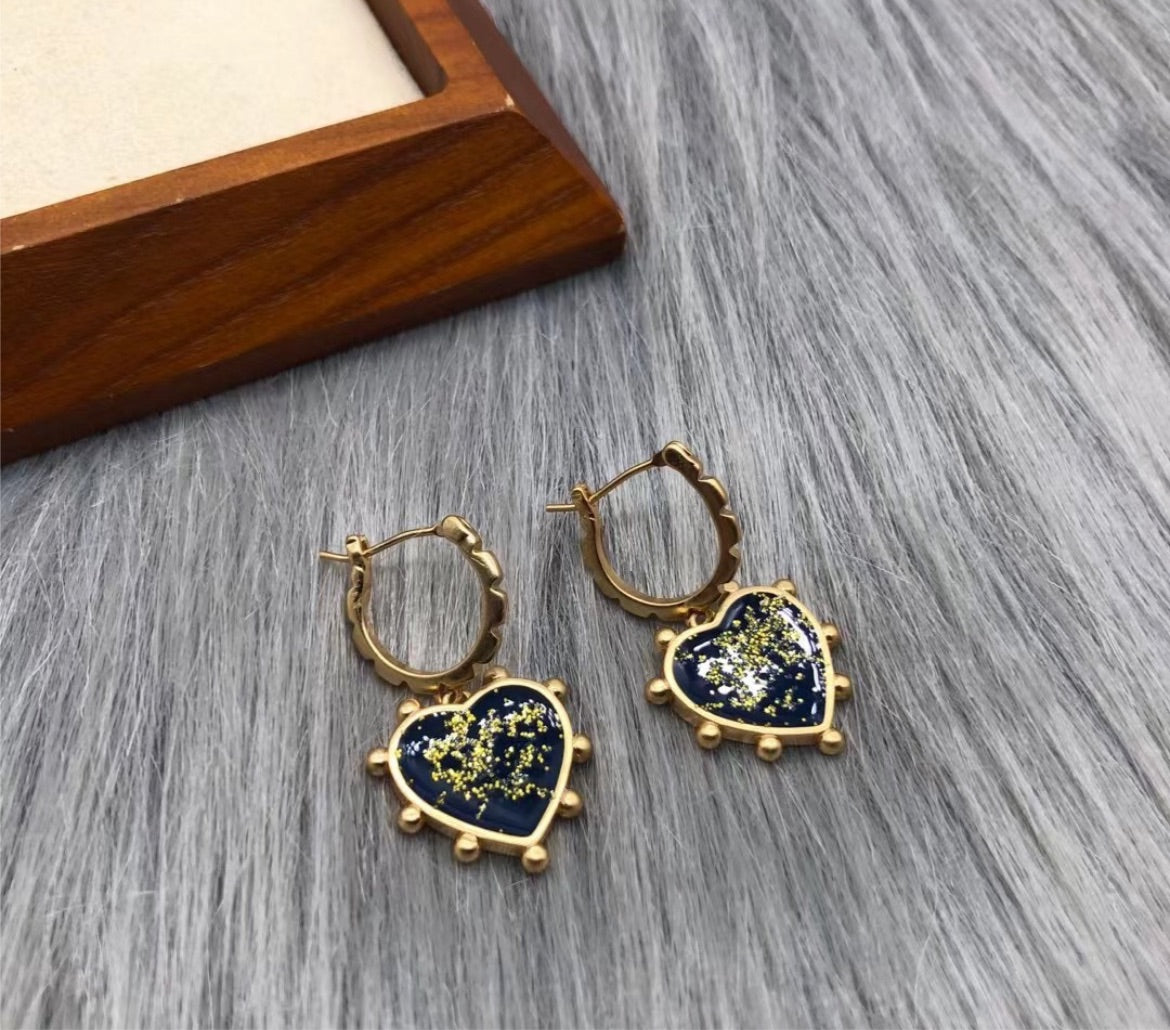 New Tory Burch woman earring