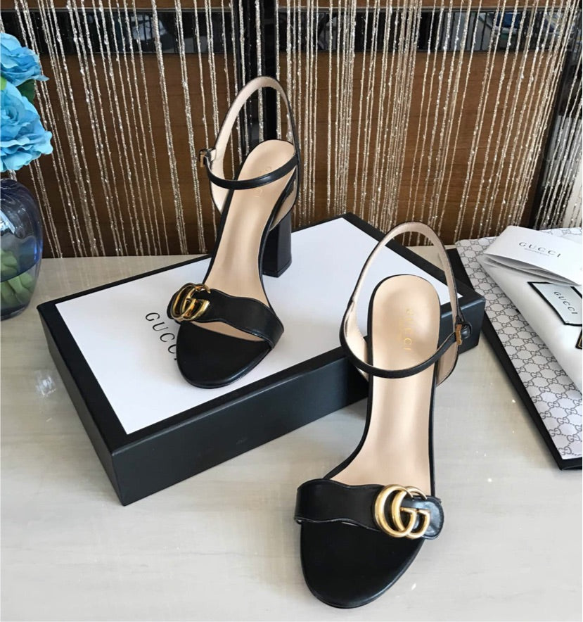 Woman black Gucci shoes