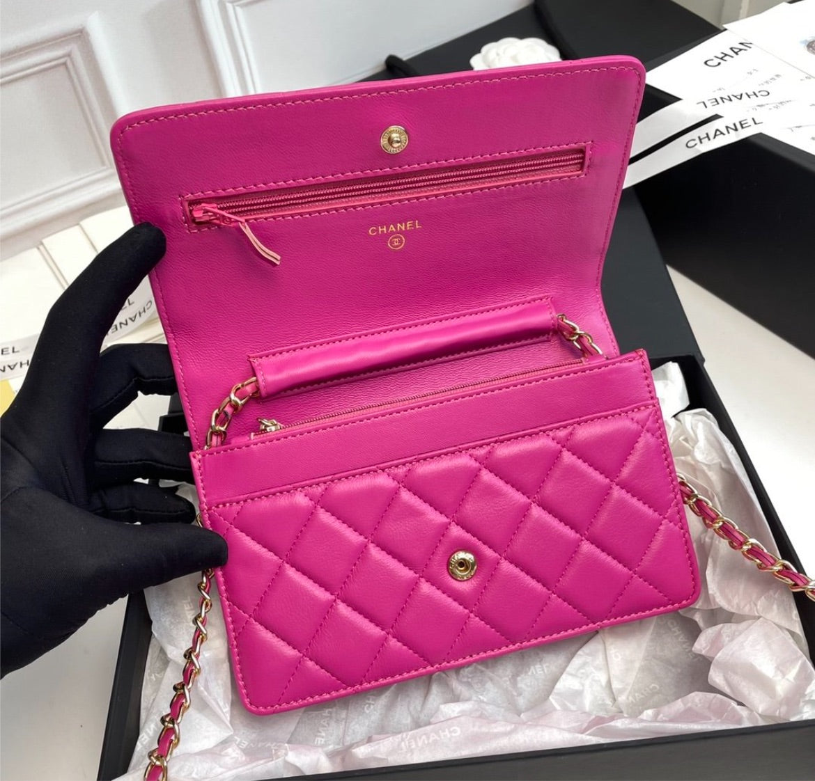 Woman pink Chanel handbag