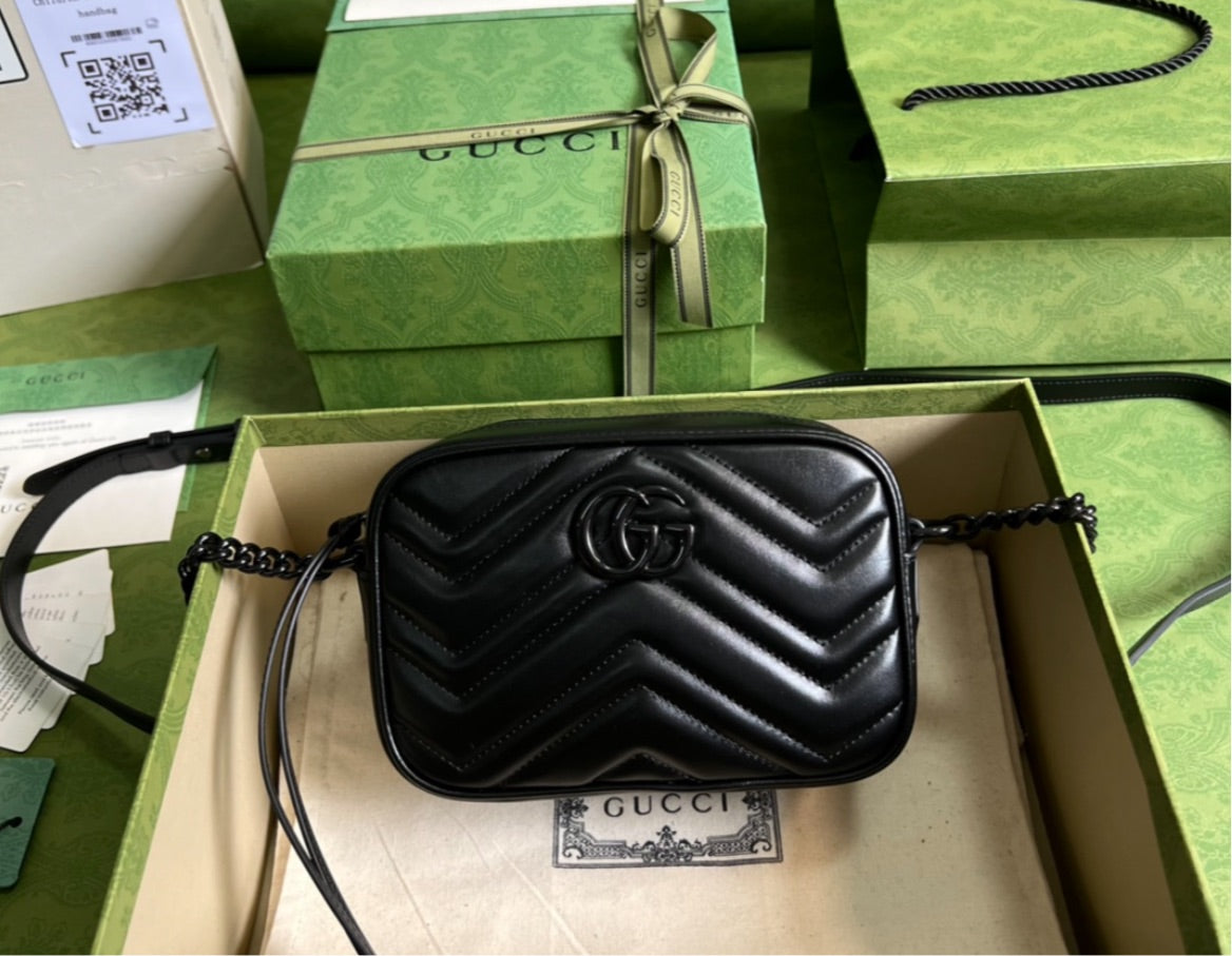 All black Gucci woman shoulder bag