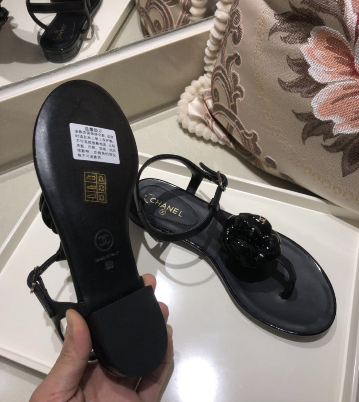 Chanel black woman sandal
