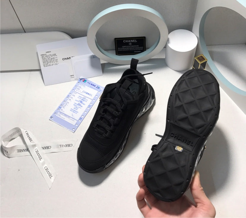 Black Chanel sneakers