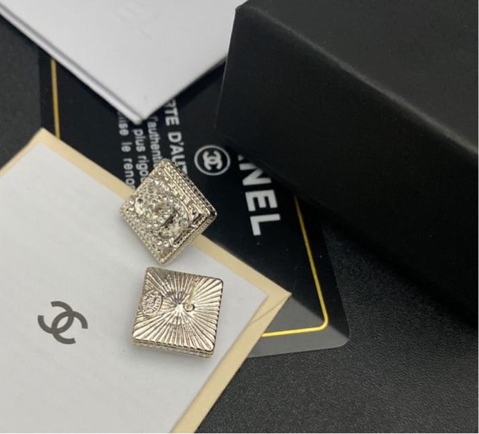 Silver Chanel studs