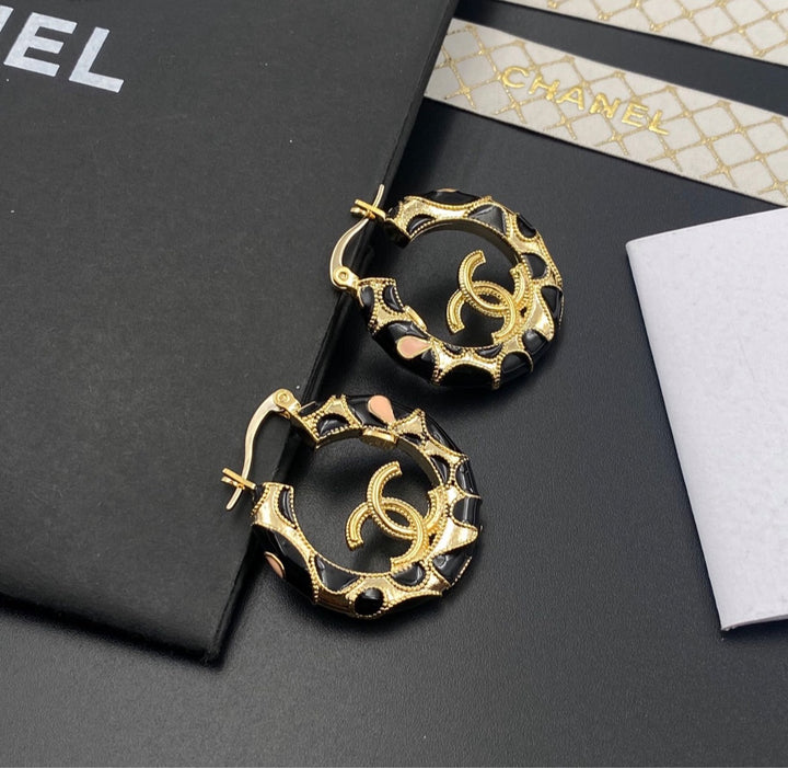 New woman Chanel earrings