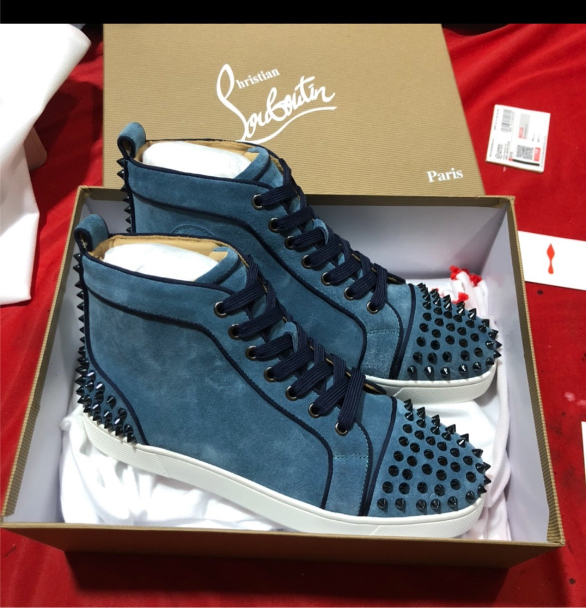 New red bottom sneakers