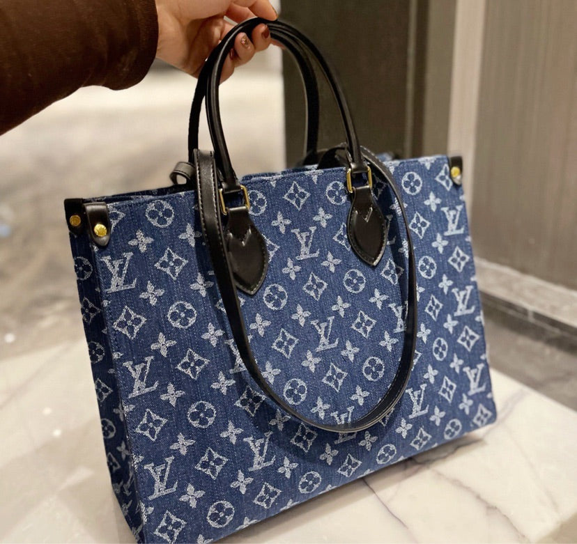 LV woman shoulder handbag