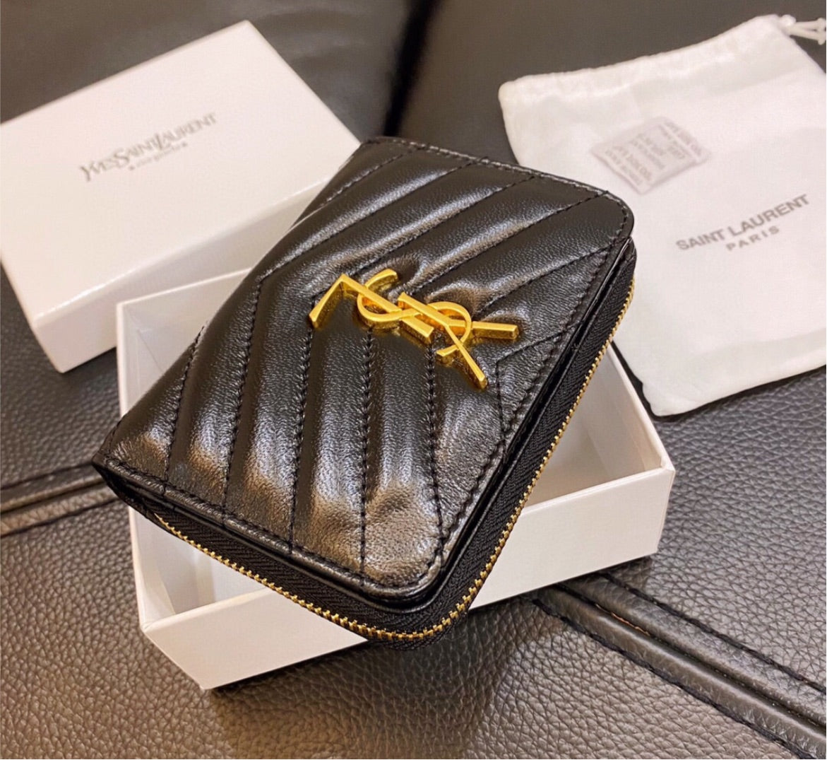 Woman YSL black wallet
