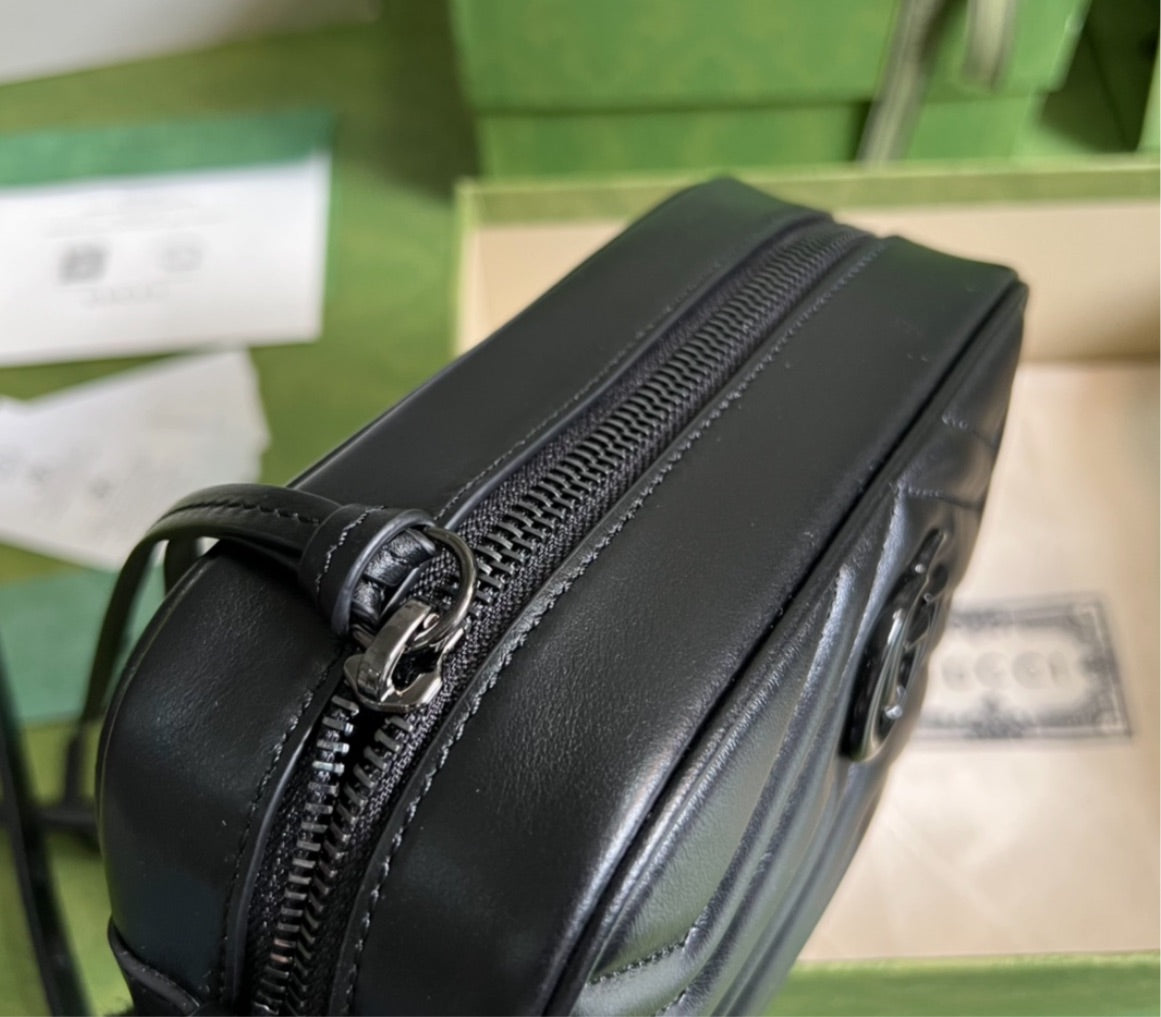 All black Gucci woman shoulder bag