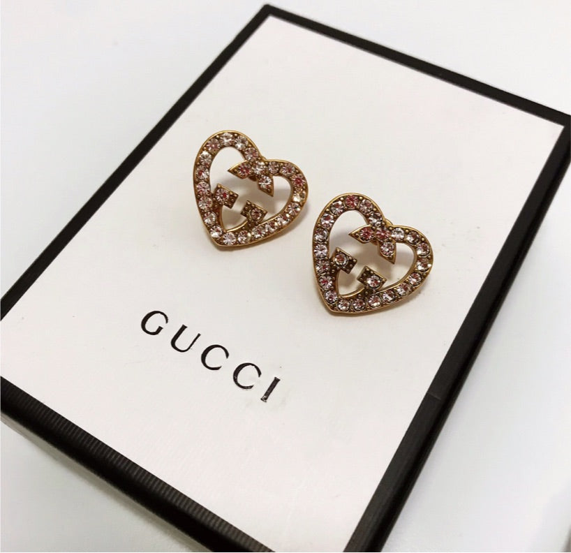 Gucci woman heart shaped earrings