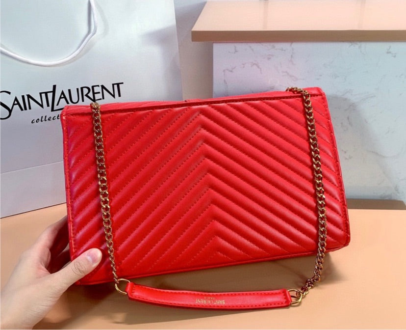 Red YSL woman handbag
