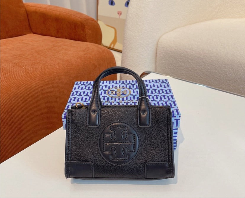 Woman Tory Burch small handbag