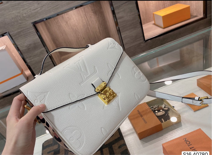 Woman leather LV shoulder handbag