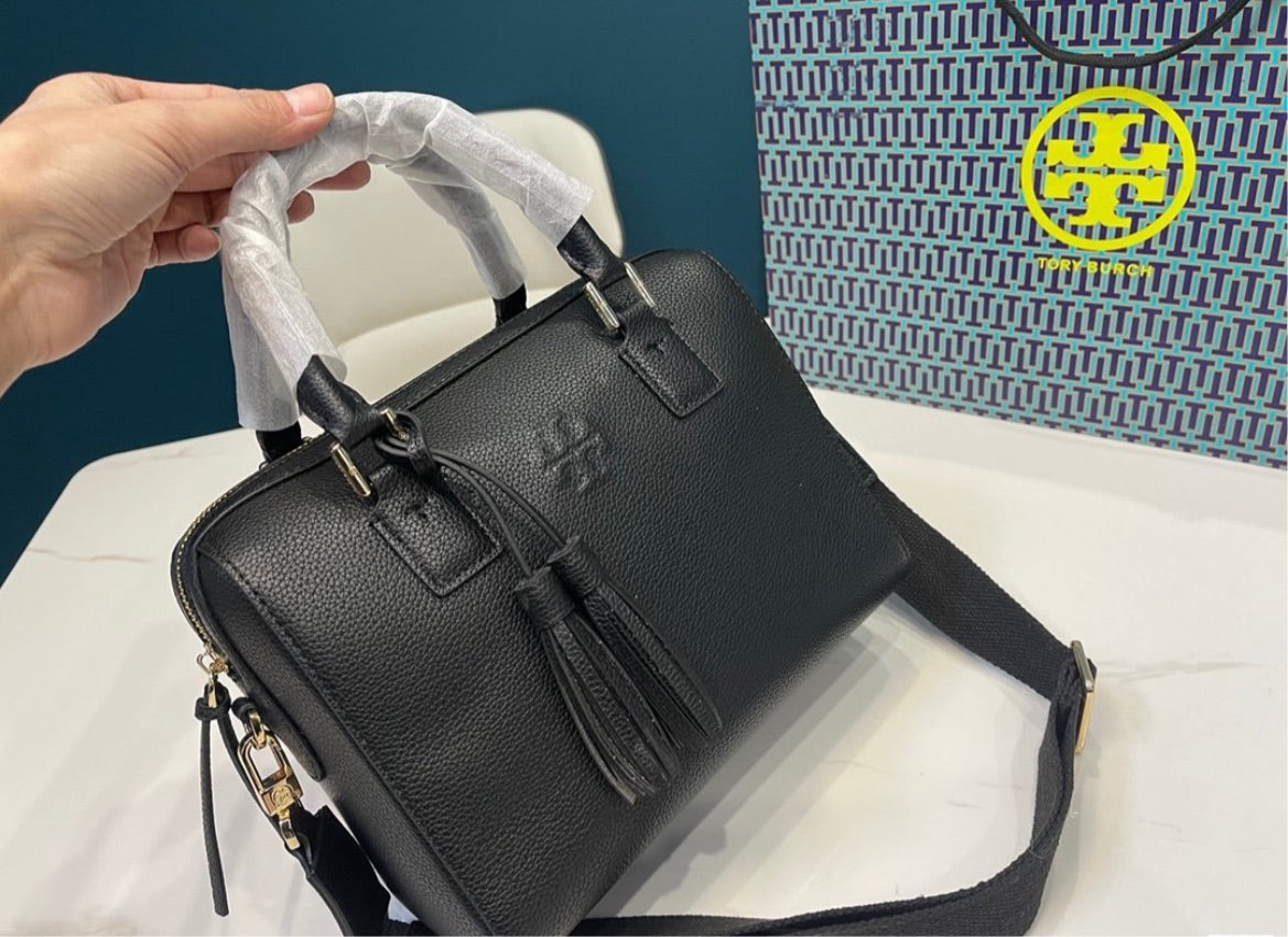 Tory Burch woman shoulder handbag