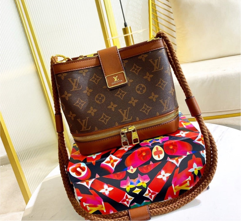 LV woman brown shoulder handbag