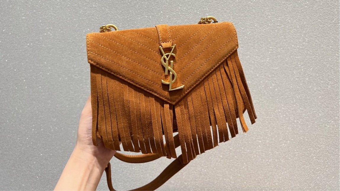 Woman Fringe YSL handbag