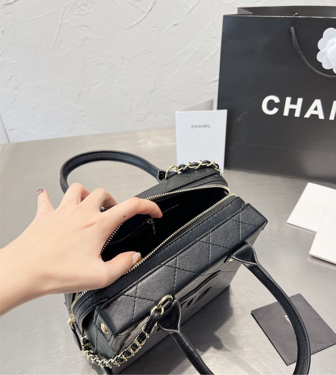 New woman Chanel handbag