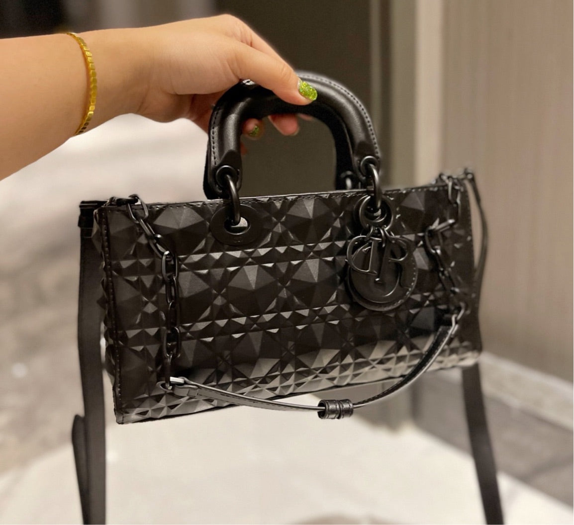 New woman Dior handbag