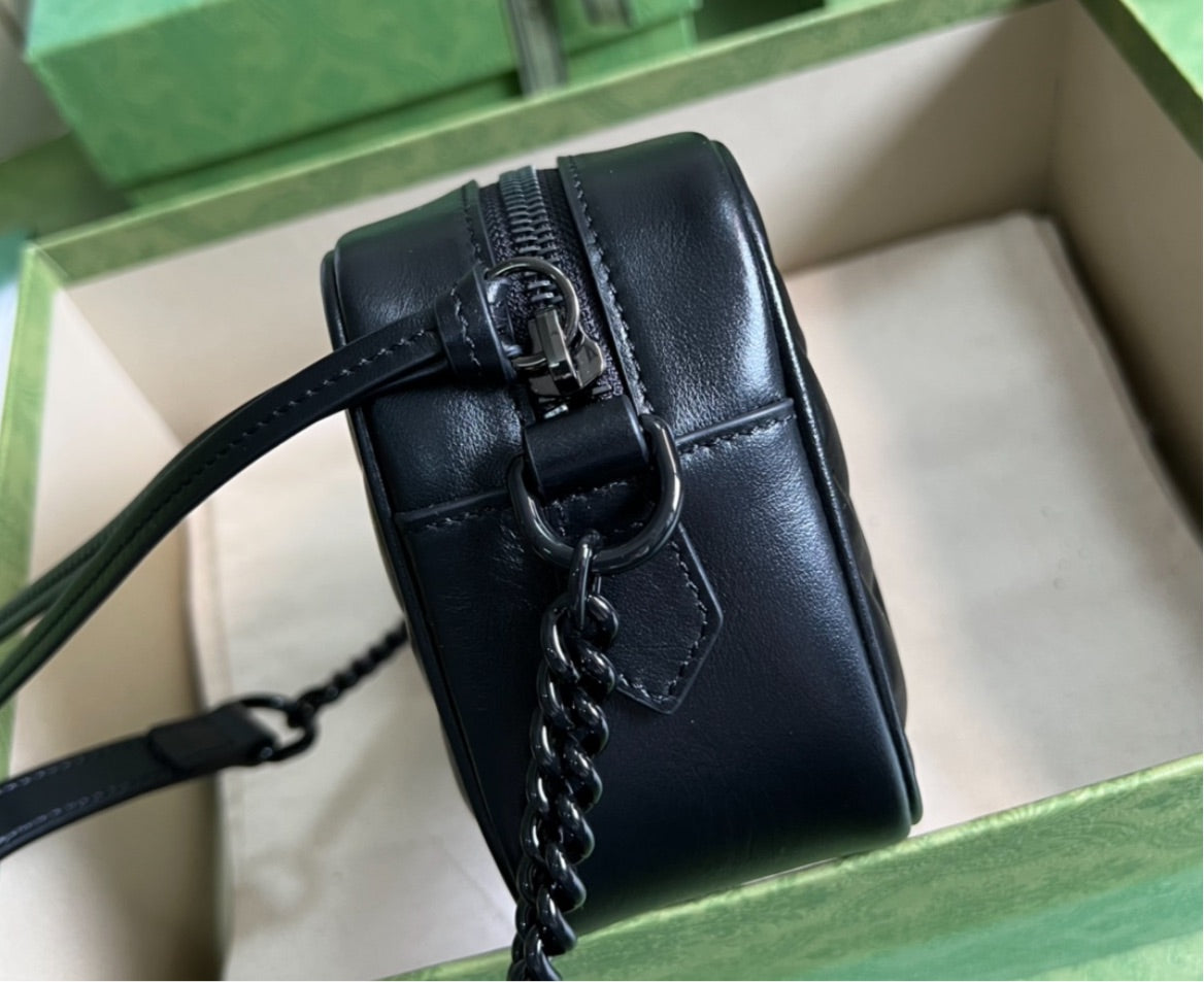 All black Gucci woman shoulder bag