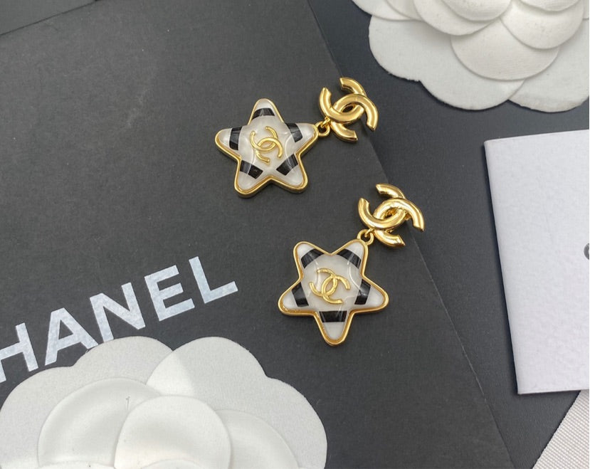 Woman Chanel earrings
