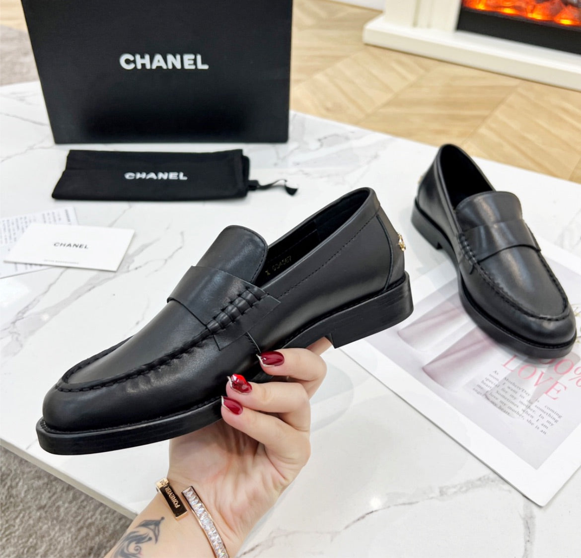 Black Chanel flat shoes